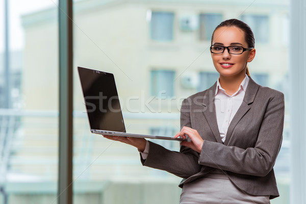Femme d'affaires portable affaires fille heureux travaux [[stock_photo]] © Elnur