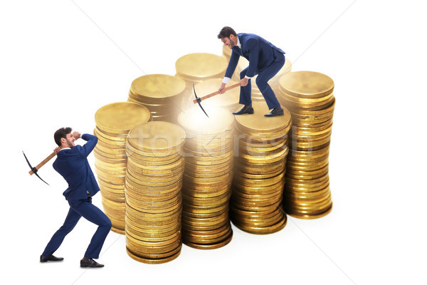 Cryptocurrency concept with businessman mining money Stock photo © Elnur