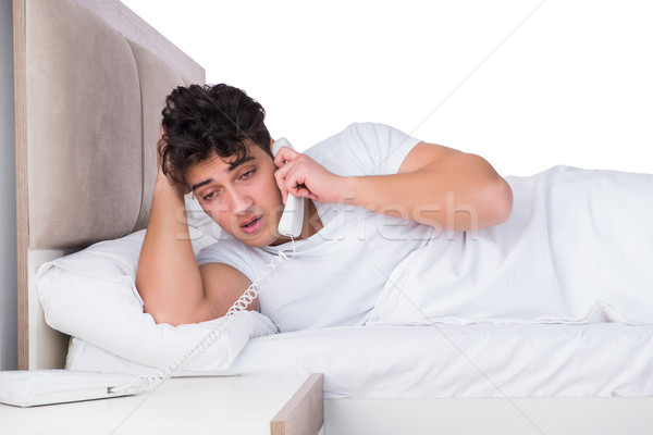 Adam yatak uykusuzluk telefon telefon Stok fotoğraf © Elnur