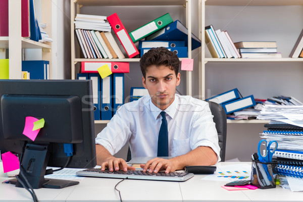 Stockfoto: Zakenman · werken · kantoor · boeken · papieren · business