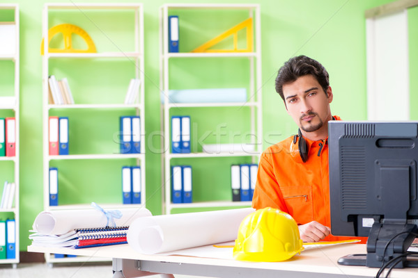 Construction supervisor planning new project in office Stock photo © Elnur