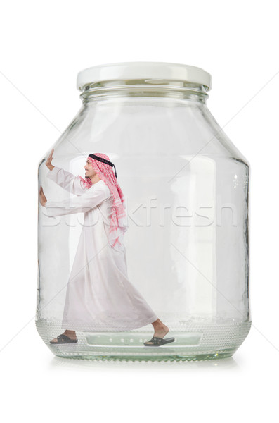 Arab businessman in glass jar Stock photo © Elnur