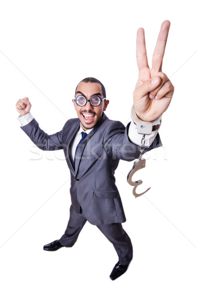 Funny businessman with handcuffs on white Stock photo © Elnur