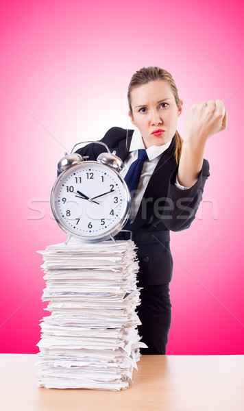 Woman businesswoman with clock and papers Stock photo © Elnur