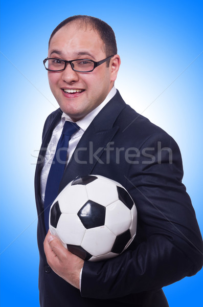 Businessman with football on white Stock photo © Elnur
