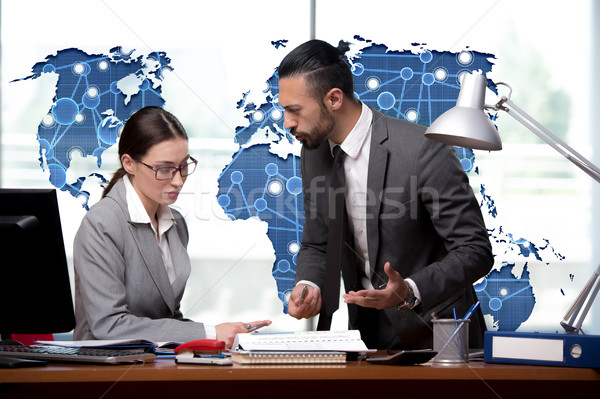 Man and woman discussing problems in globalisation concept Stock photo © Elnur