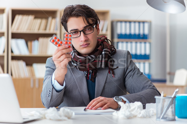 The sick businessman suffering from illness in the office Stock photo © Elnur