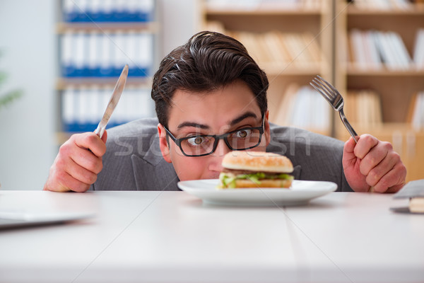 Stockfoto: Hongerig · grappig · zakenman · eten · sandwich