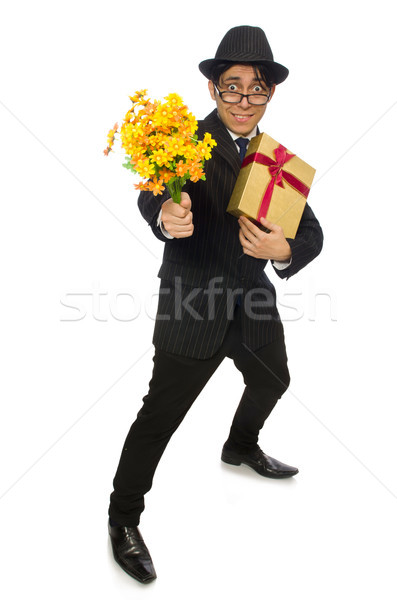 Funny man with flowers and giftbox Stock photo © Elnur