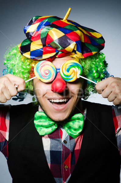 Funny clown with sweet lollipop Stock photo © Elnur