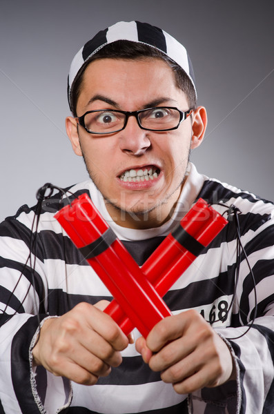 Vicces fogoly dinamit izolált szürke férfi Stock fotó © Elnur