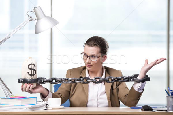 Woman chained to her working desk Stock photo © Elnur
