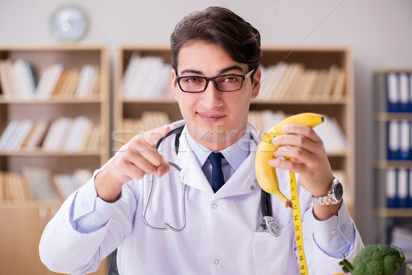 Doctor in dieting concept with fruits and vegetables Stock photo © Elnur