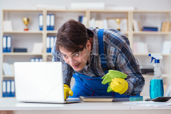 The hacker under cleaner cover stealing personal data Stock photo © Elnur