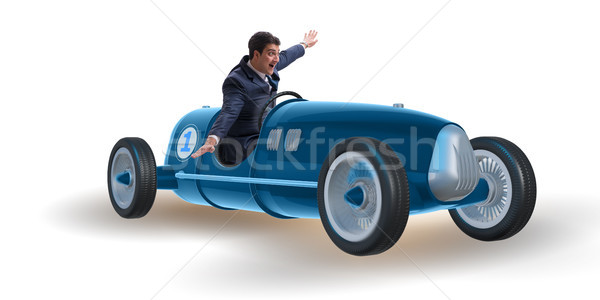 Businessman in vintage roadster isolated on white Stock photo © Elnur