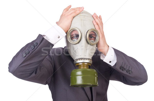 Businessman wearing gas mask isolated on white Stock photo © Elnur