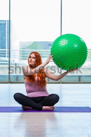 Young woman exercising with swiss ball Stock photo © Elnur