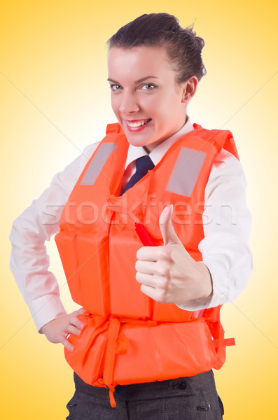 Stock photo: Young woman with life vest on white