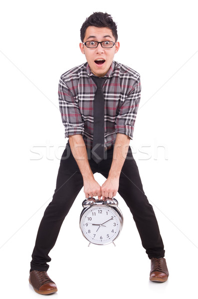 Stock photo: Man with clock trying to meet the deadline isolated on white