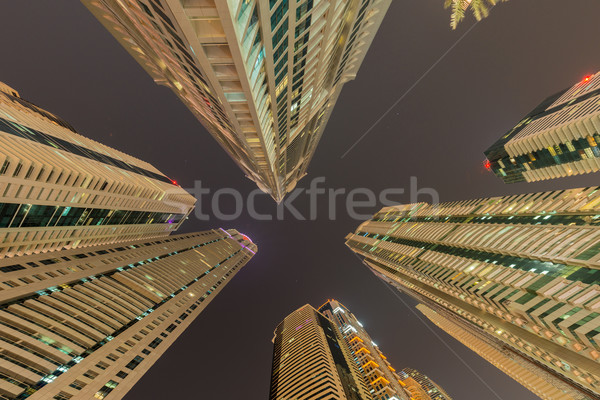 Wolkenkratzer Dubai Nacht Gebäude Stadt Bau Stock foto © Elnur