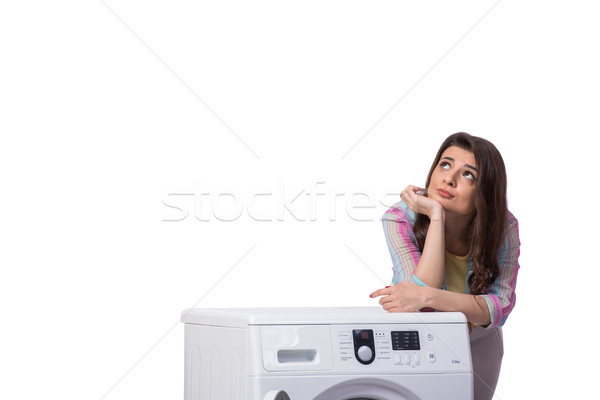 Woman tired after doing laundry isolated on white Stock photo © Elnur