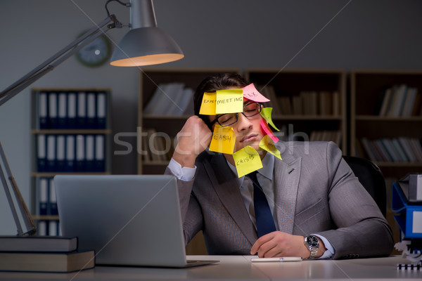 Businessman staying late to sort out priorities Stock photo © Elnur