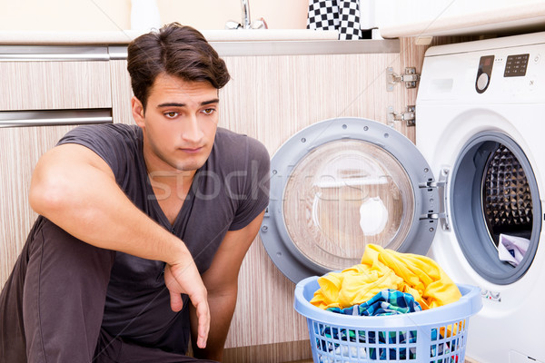 Młodych mąż człowiek pranie domu uśmiech Zdjęcia stock © Elnur