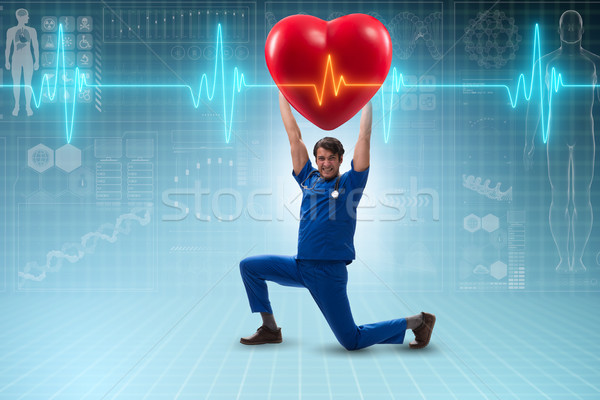 Man doctor in cardiology telemedicine concept Stock photo © Elnur