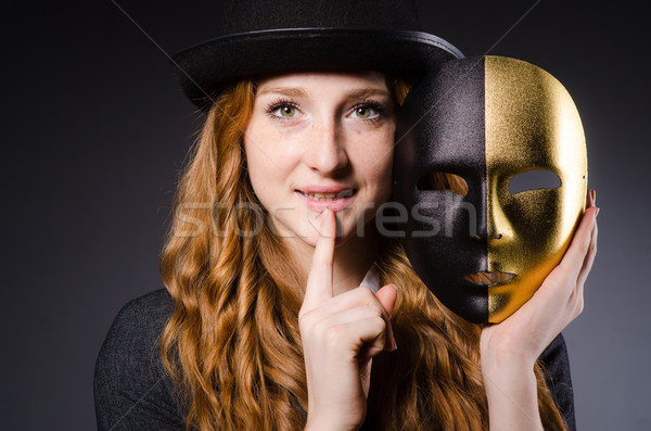 Woman with mask in hypocrisy concept Stock photo © Elnur