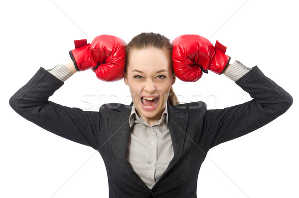 Businesswoman with boxing gloves isolated on white Stock photo © Elnur