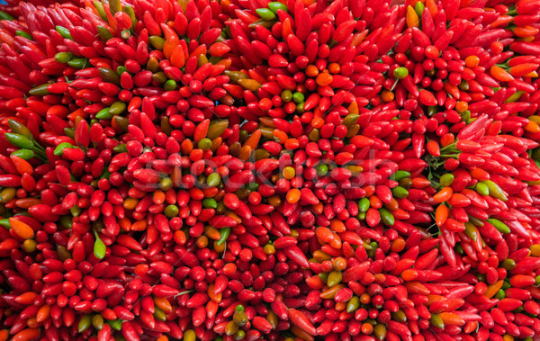 Lots of red peppers arranged at the market Stock photo © Elnur