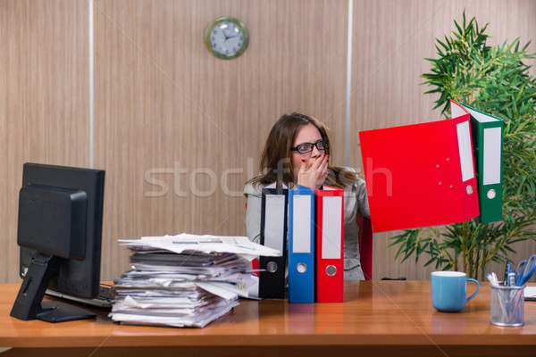 Businesswoman under stress working in the office Stock photo © Elnur
