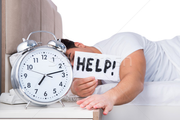 Férfi ágy szenvedés álmatlanság óra szomorú Stock fotó © Elnur