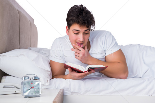 Man bed lijden slapeloosheid klok nacht Stockfoto © Elnur