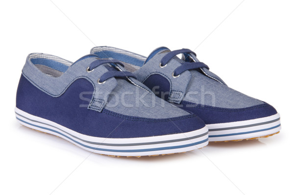 Sporty shoes in sport shoes concept on white Stock photo © Elnur