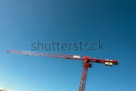 Construction crane on bright summer day Stock photo © Elnur