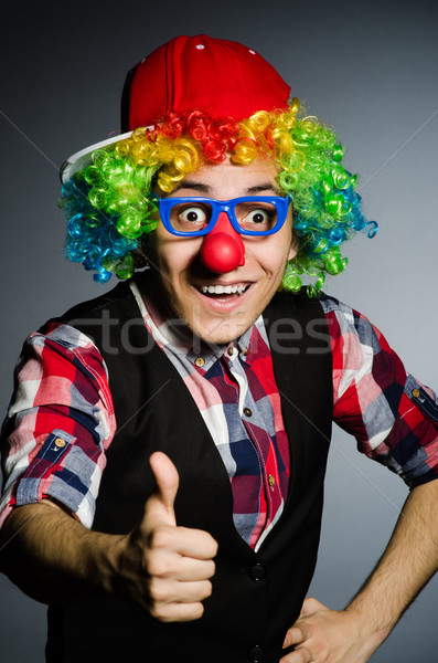 Funny clown against the dark background Stock photo © Elnur
