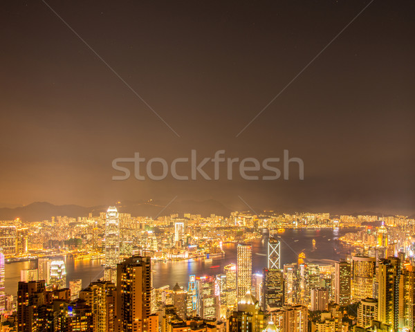 Vista Hong Kong puesta de sol cielo edificio ciudad Foto stock © Elnur