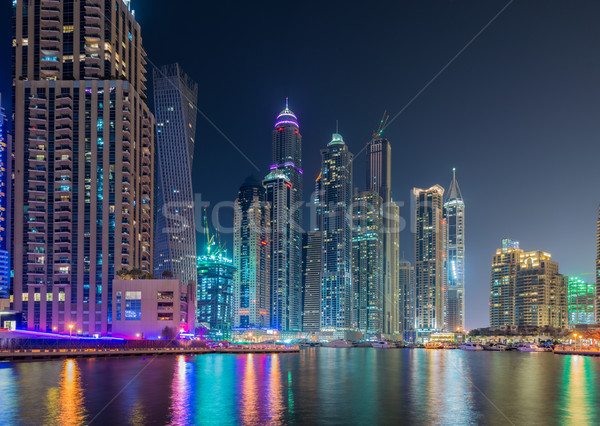 Dubai marina felhőkarcolók éjszaka égbolt víz Stock fotó © Elnur