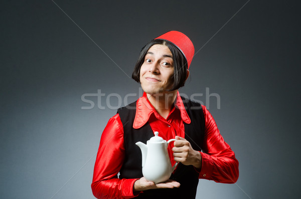 Man wearing red fez hat Stock photo © Elnur