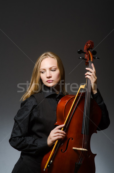 Woman playing classical cello in music concept Stock photo © Elnur