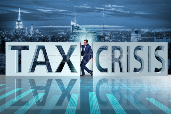 The businessman in tax and crisis concept Stock photo © Elnur