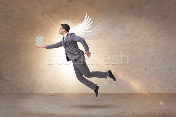 Angel investor concept with businessman with wings Stock photo © Elnur