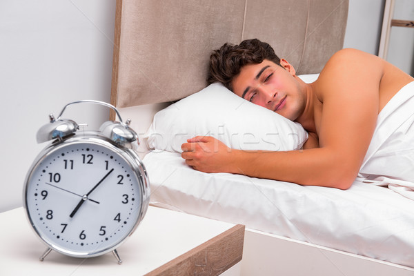 Man having trouble waking up in the morning Stock photo © Elnur