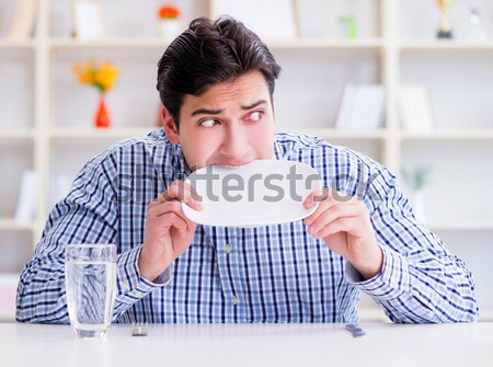 Stock photo: The man on diet waiting for food in restaurant