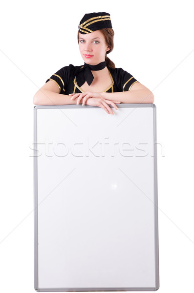 Stewardess with blank board on white Stock photo © Elnur