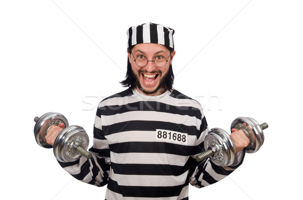 Prison inmate with dumbbells isolated on white Stock photo © Elnur