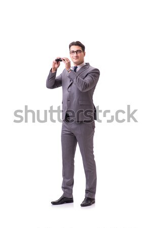 Young man holding hammer isolated on white Stock photo © Elnur