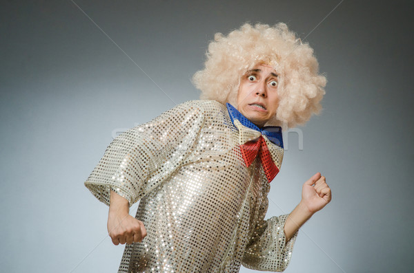Funny man with afro wig Stock photo © Elnur