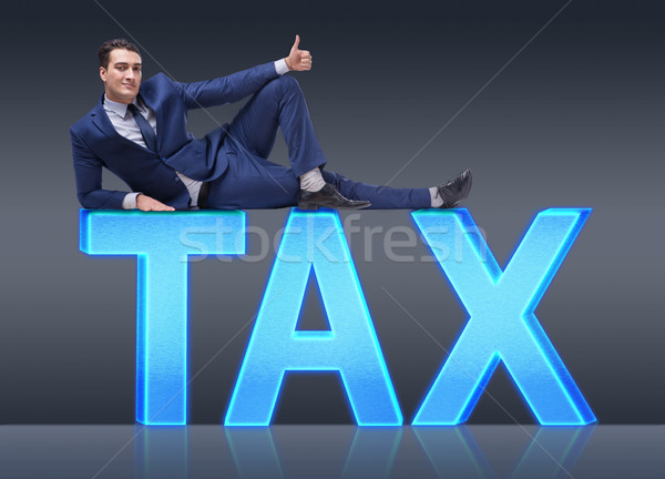 Businessman in tax burden business concept Stock photo © Elnur
